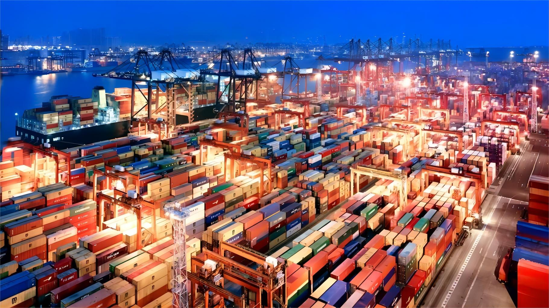 Freight ship entering a major Latin American port at sunset